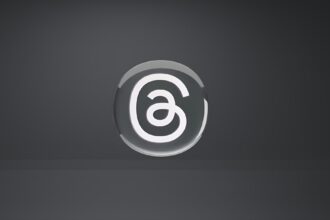 a white and black logo on a black background