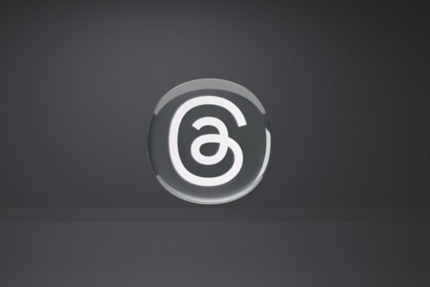 a white and black logo on a black background
