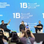 Speakers on stage at 1 billion followers summit event.