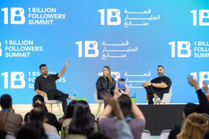 Speakers on stage at 1 billion followers summit event.