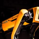 a close up of a yellow and black bike