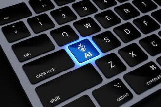 a computer keyboard with a blue light on it