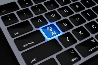 a computer keyboard with a blue light on it