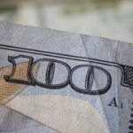 a close up of a hundred dollar bill