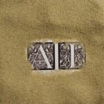 A close up of a metal object on sand