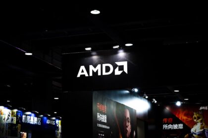 Amd logo illuminated on a dark ceiling