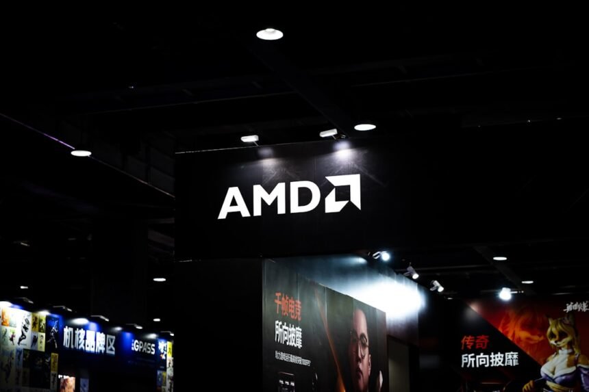 Amd logo illuminated on a dark ceiling