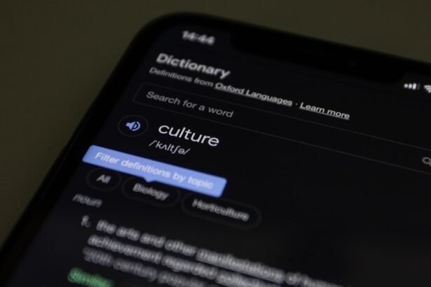 a close up of a cell phone with a dictionary on the screen