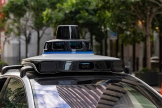 Self-driving car with sensors on city street