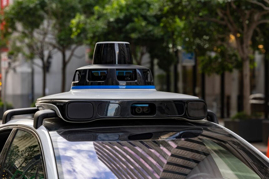 Self-driving car with sensors on city street