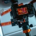 Camera digitizing film negatives on a light table