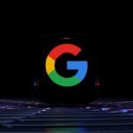 a close up of a computer keyboard with the google logo on it