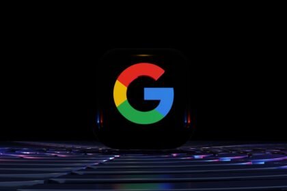 a close up of a computer keyboard with the google logo on it
