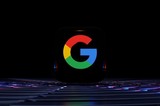 a close up of a computer keyboard with the google logo on it