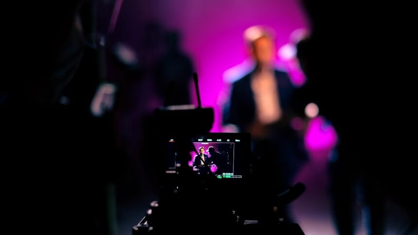 a person taking a picture with a camera