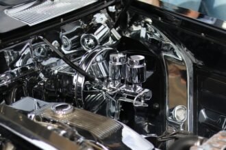 Classic car engine with shiny chrome components and details