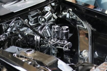 Classic car engine with shiny chrome components and details