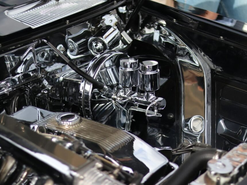 Classic car engine with shiny chrome components and details