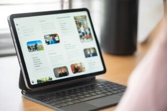 Digital tablet with keyboard case on a wooden surface