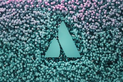 a blue triangle surrounded by pink and blue bubbles